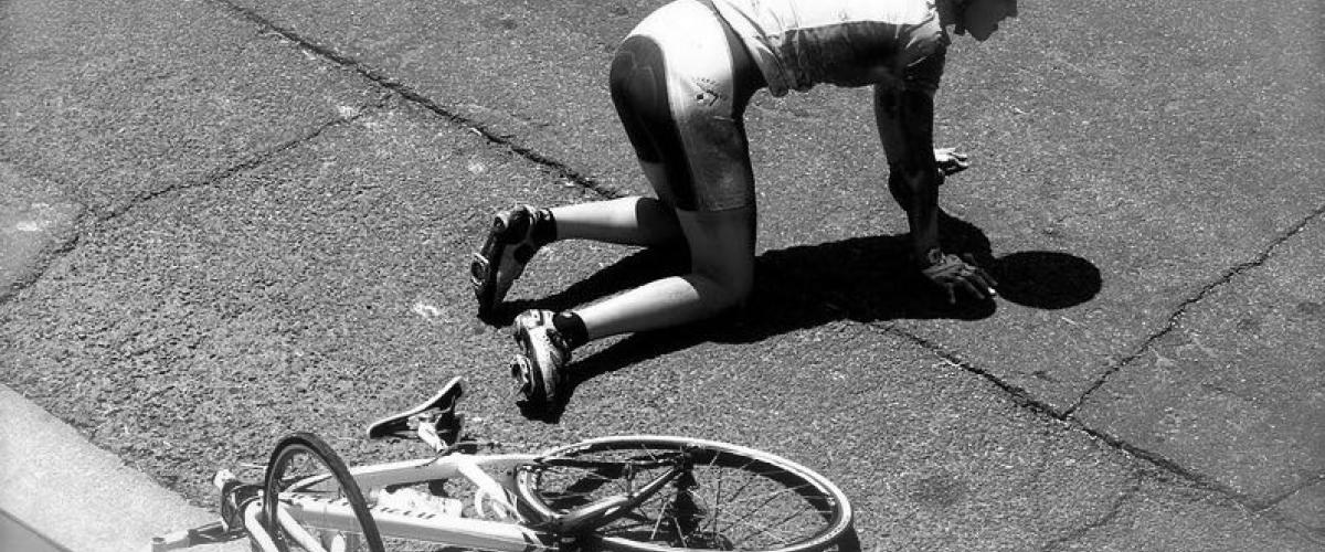 Bike Crash Victim - Photo by Bill Morrow; used with permission under Creative Commons license (https://creativecommons.org/licenses/by/2.0/) and modified to monchromatic